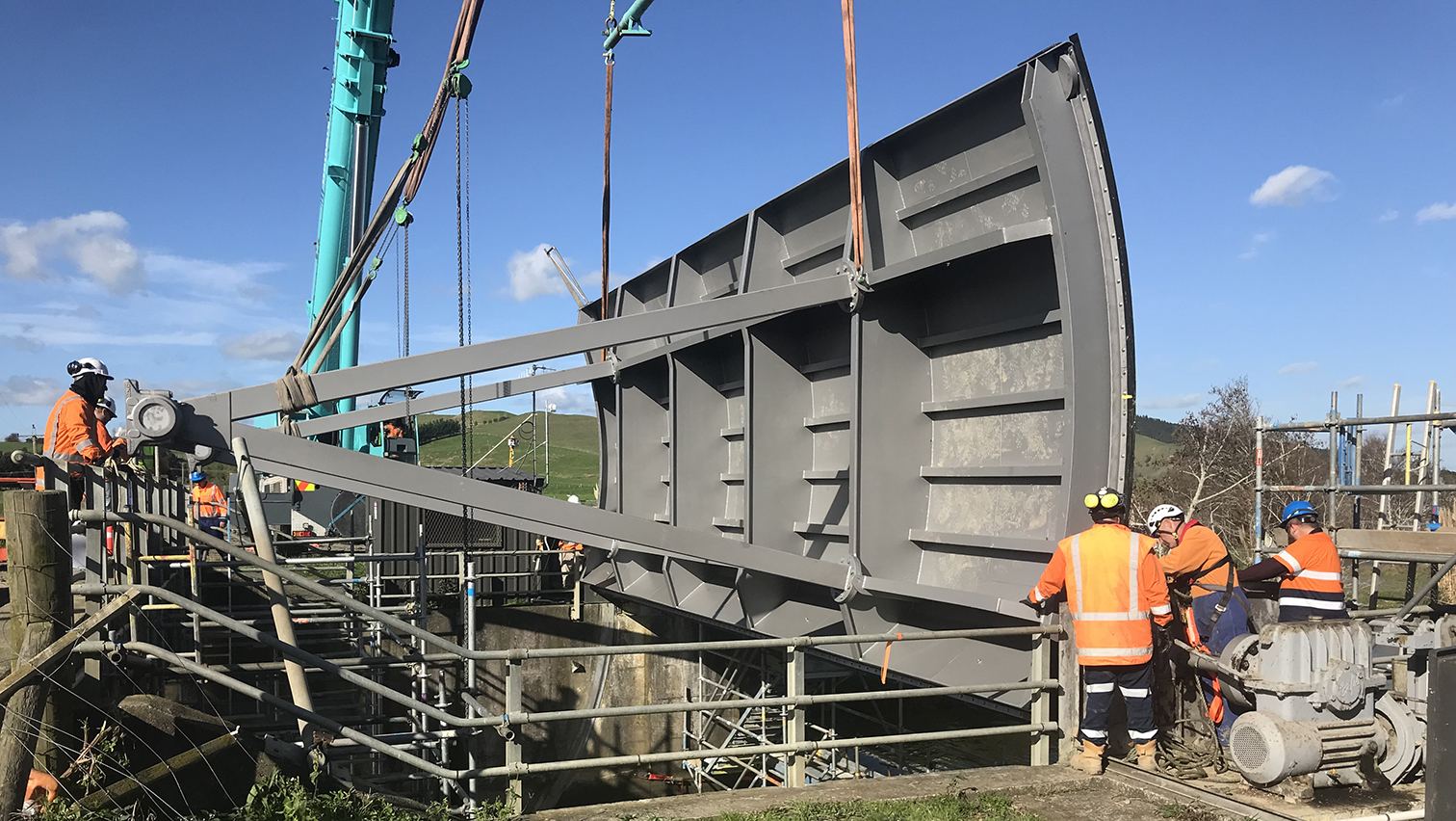 Lining the control gate up and getting ready to lower back into place in Lake Waikare.