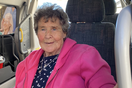 Brenda Fagg sitting in the Te Kuiti 4H Community House mobility van