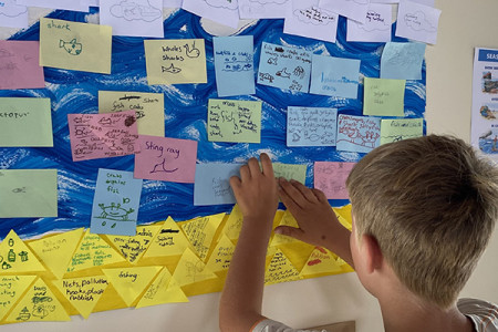 Students pool their marine knowledge on a colourful visual board