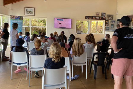 Students watch a video for their marine workshop
