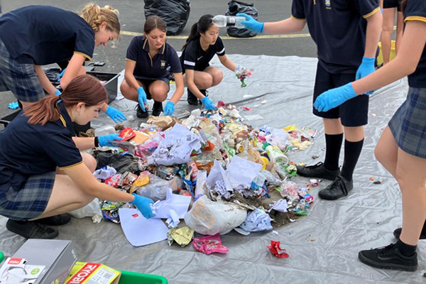 Students completing a waste audit on their schools waste