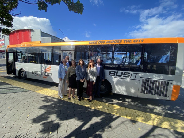 Councillors and staff outside Meteor bus